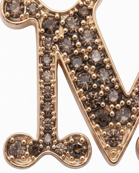 MAX MARA FACELLA SPILLA LOGO