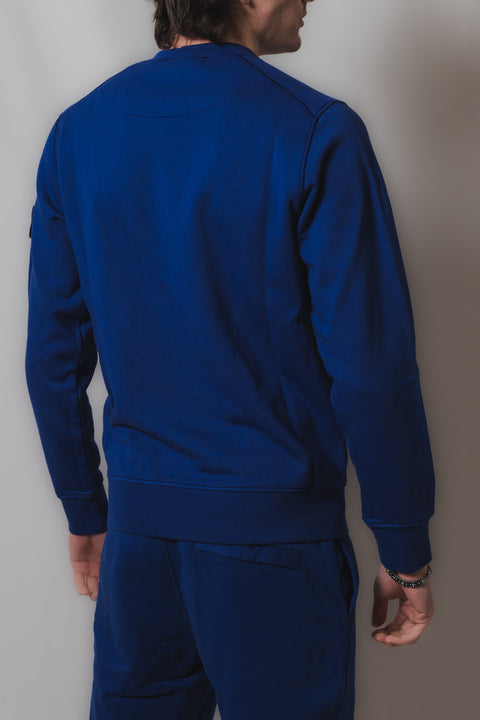STONE ISLAND FELPA REALIZZATA NEL CLASSICO TESSUTO FELPA CON BADGE LOGO SU BRACCIO